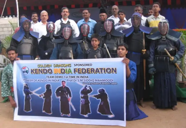 Members with the federation banner