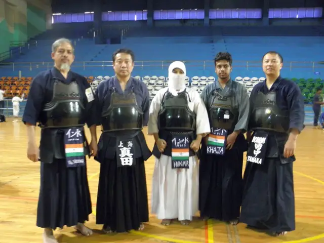 Indian kendoka in full bōgu, with the tricolour on their tare